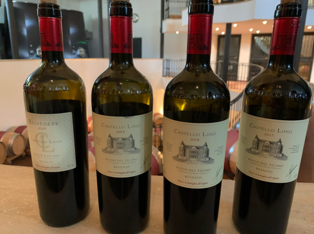 Four bottles of Castello Luigi wines, acclaimed for their superior quality.